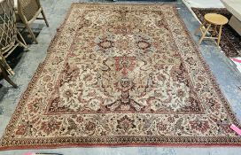 Large cream ground carpet with central floral medallion on floral field, multiple floral and