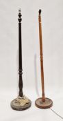 Mahogany standard lamp with a turned fluted column on circular base, 157cm high, and an oak standard