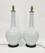 Pair of contemporary gourd-shape grey porcelain table lamps, each with geometric decoration,
