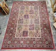 Modern Egyptian Valby Ruta red ground rug made in Ikea with central floral grid of four rows of