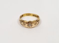 18ct gold and diamond dress ring, the three old cut diamonds within star settings (size P) Condition