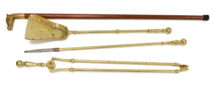 Wooden spirit walking stick with brass horse head handle, the handle unscrewing to reveal an inner