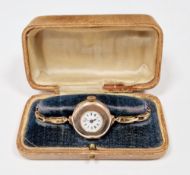 Early 20th century 9ct gold lady's wristwatch, the enamel dial having Roman numerals denoting hours,