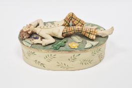Helen Kemp (contemporary) a hand-modelled earthenware lidded oval dish, the lid with male figure