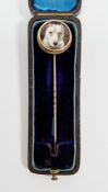 Victorian yellow metal stickpin, the circular porcelain panel painted with a bull terrier dog,