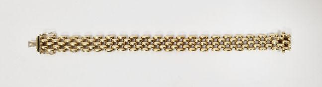 9K gold collarette bracelet, 70’s style, five pierced rows of bar-pattern links, 21.1g total approx.