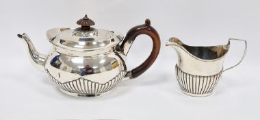 Victorian silver bachelor's teapot, oval with stained wood gadrooned finial and scroll handle, the