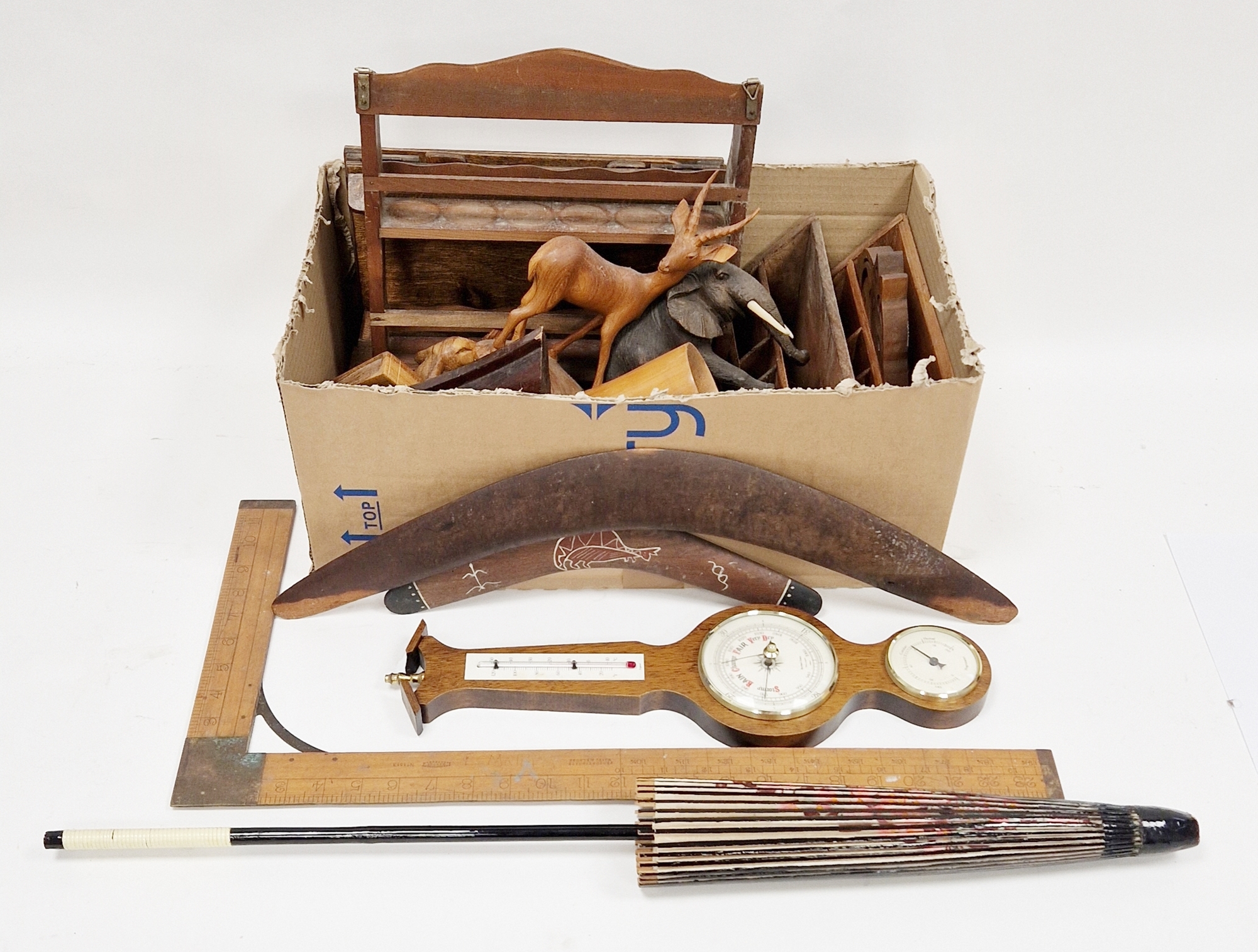 Collection of wooden items including Australian boomerang, folding easel, stationery racks, Rabone