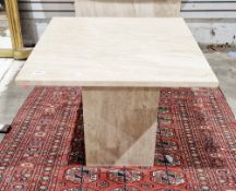 Italian Travertine marble square coffee table with shaped sides and raised on a substantial square