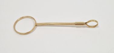 Asprey's of London 9ct gold cigarette holder comprising a split post expanding to an adjustable