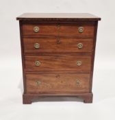 Reproduction Georgian mahogany small chest of four long drawers with brass ring drop handles and