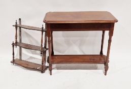 Mahogany waterfall hanging shelf, the three shaped shelves joined by turned spindle supports, 53cm
