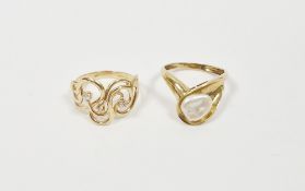 9K gold and baroque pearl ring and a 9ct gold and triple white stone loop-pattern ring (2)