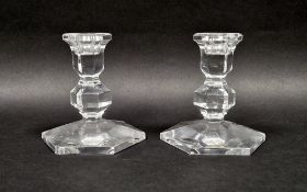Pair of Val St. Lambert faceted glass candlesticks, etched marks, each on short baluster stem and