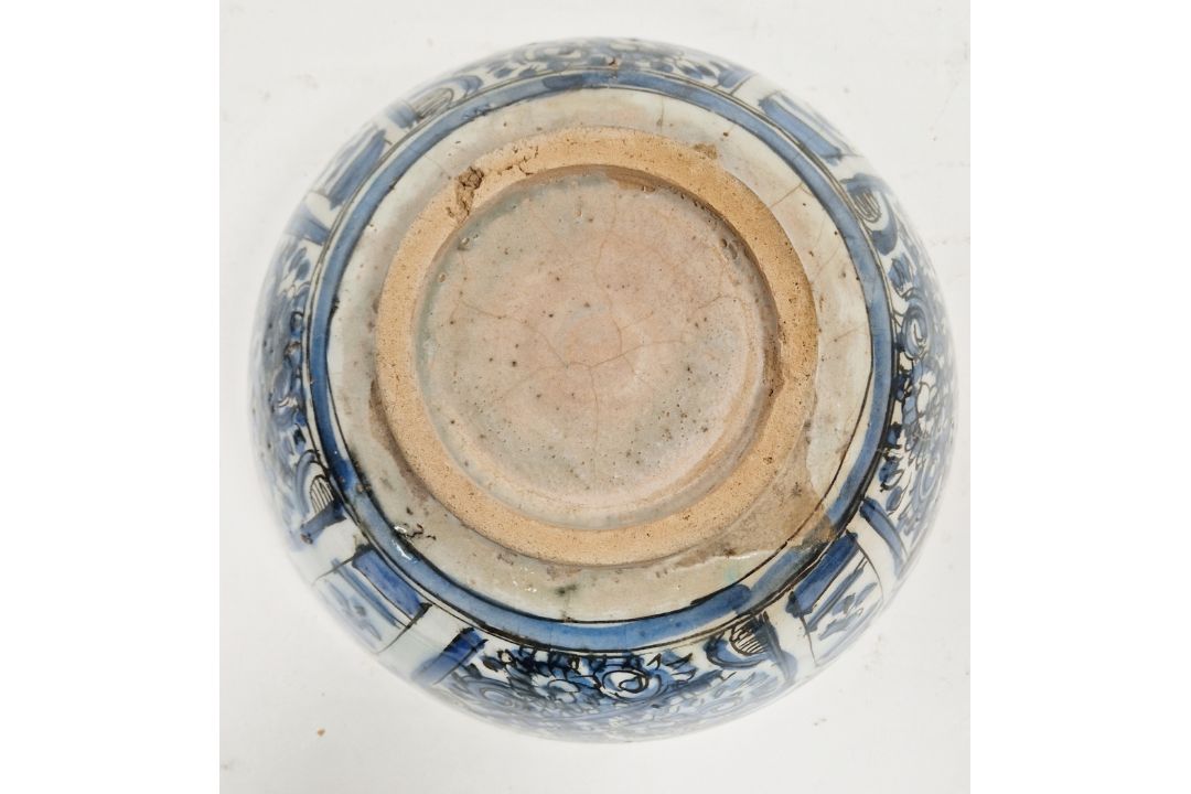 Persian (Iran) blue and white bowl, 18th century, painted with panels of flowers and lappet-shaped - Image 2 of 2