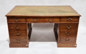 Victorian-style mahogany twin-pedestal desk, the green leather inset top with ogee moulded edge over
