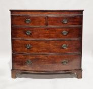 Early 19th century mahogany bow front chest of two short over three graduating long drawers, the