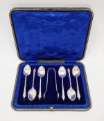 Set of six George V silver Apostle teaspoons and matching sugar tongs, Sheffield 1911 and 1913