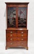 19th century mahogany and cross-banded library bookcase, the upper section with cavetto and Greek