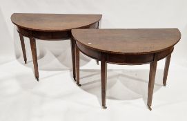 Pair of early 19th century oak demi-lune side tables, the plain friezes with moulded edges and