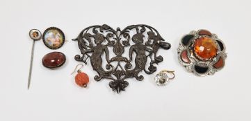 Scottish white metal target brooch set with a central orange paste stone and panels of carnelian and