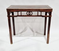 Chinese hard wood side table, the rectangular top over a geometrically carved frieze and raised on