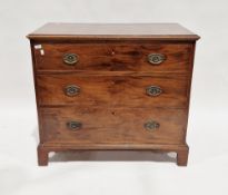 George lll style mahogany chest of three graduated long drawers, the top with moulded edge and the