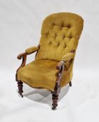 Victorian buttonback armchair, the open mahogany frame with scrolling arms and raised on turned