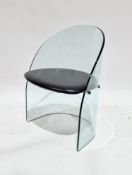 Mid century, circa 1980's Italian-style sculptural smoky glass tub chair in the manner of Fiam, with
