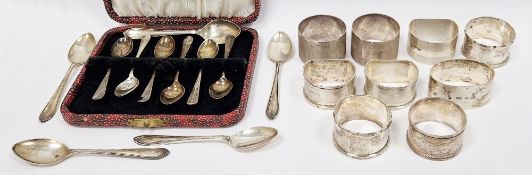 Three pairs of early 20th century silver napkin rings, one pair with engine turned decoration and