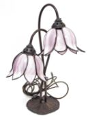 Art Nouveau style table lamp in the manner of Tiffany, with two branches in the form of flowers with