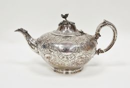 Victorian silver teapot, London 1857 Edward Ker Reid, of squat globular form with chased scrolling