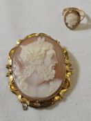 Gold-coloured metal and cameo brooch, the oval cameo carved with head and shoulders of Zeus within