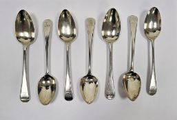 Matched set of seven George III table spoons, two London 1783 (maker's marks rubbed), three London
