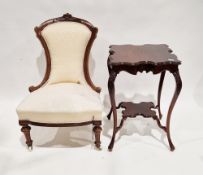 Early 20th century mahogany centre table with shaped top and raised on carved cabriole legs united