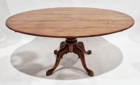 19th century style oval tilt top dining table, the elm top raised on a turned column support and