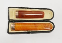 Two Victorian 9ct gold and amber cheroot holders, both hallmarked, one date 1900 (8cm long) in