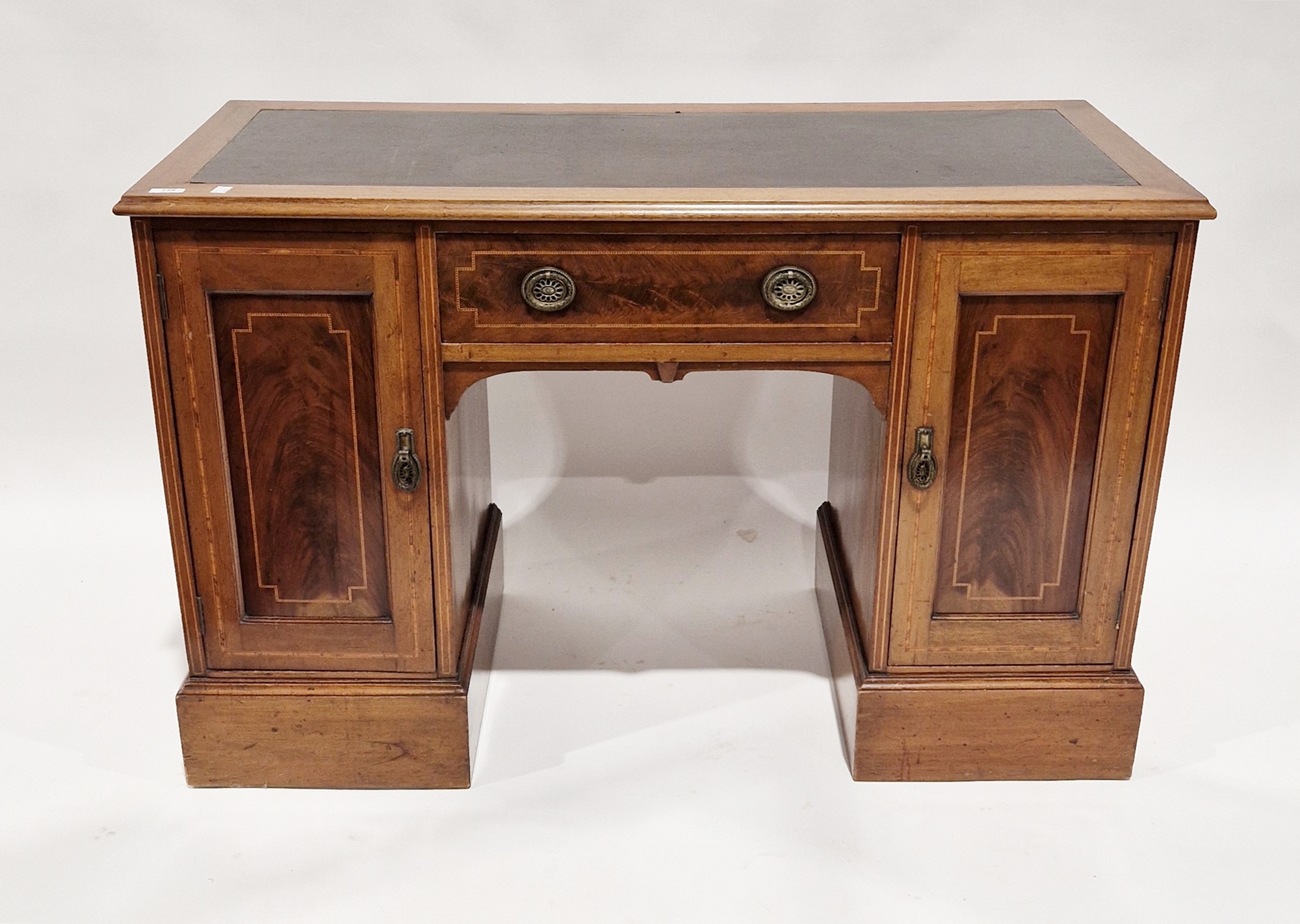 Edwardian mahogany kneehole desk with simulated leather inset top and ogee moulded edge, the