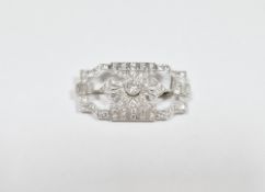 Art Deco diamond white metal openwork brooch, the principal round brilliant cut diamond to centre