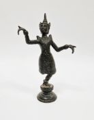 Small cast bronze figure of a dancing deity, possibly Hindu, approximately 14cm high