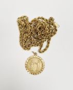 9ct gold circular pendant decorated with two figures, bright cut border, 3.8g approx. on gilt