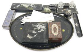 Collection of black lacquered papiermache items including two 19th century mother of pearl inlaid
