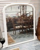 Large 19th century overmantel mirror, the arched wooden frame later painted white and carved with