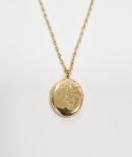 9ct gold engraved oval locket on fine Prince of Wales pattern chain, 5.7g total approx.