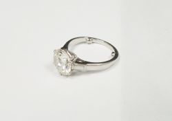 Diamond solitaire white metal ring, the round brilliant cut diamond measuring approx. 9.33 x 9.31