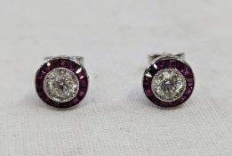 Pair white gold-coloured metal, diamond and ruby stud earrings, each with diamond approx. 0.5ct