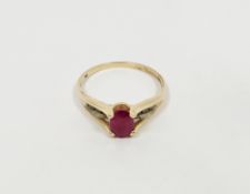 10K gold, pink and white stone ring set oval claw set pink stone, possibly ruby and six small