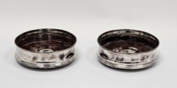 Pair of silver and mahogany wine bottle coasters, Sheffield 1997, Carr's of Sheffield Ltd, 12.5cm