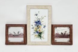 Two framed 18th century Dutch Delft manganese tiles, each painted with figures in boats and an