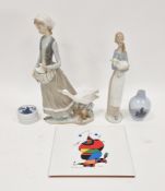 Lladro porcelain figure of a girl and ducks, 31cm high, another of a girl with a lamb, a small Royal